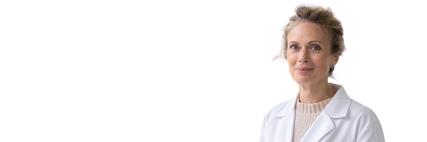 Woman in a white coat representing vaginal microbiome testing and laboratory analysis